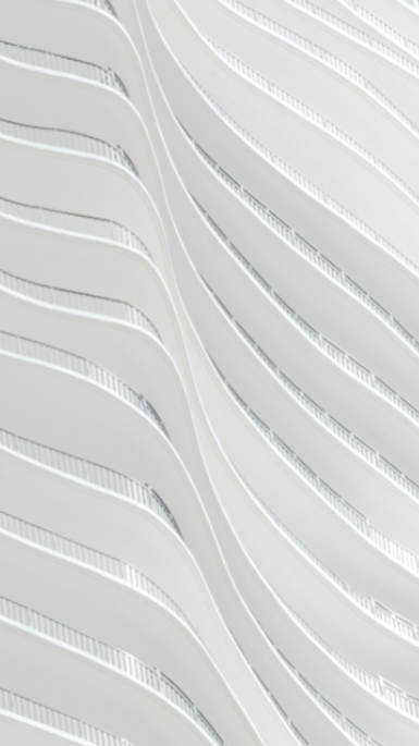 curved white building 
