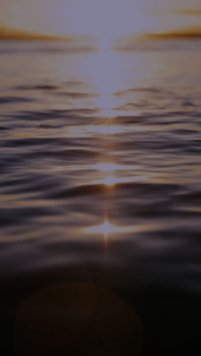 sunrise over ocean water