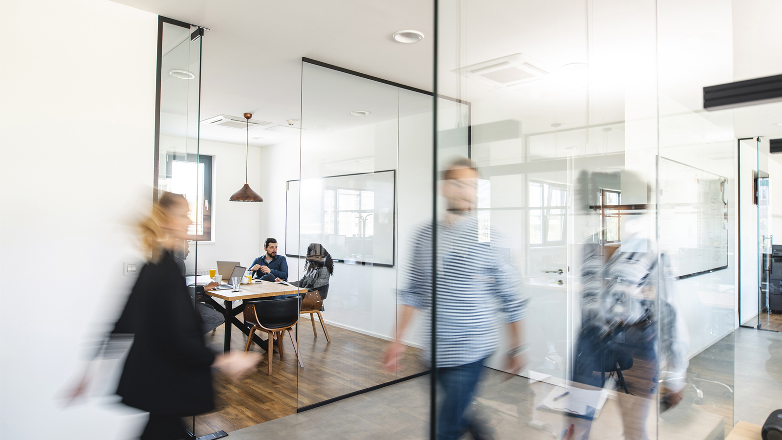 people walking in office