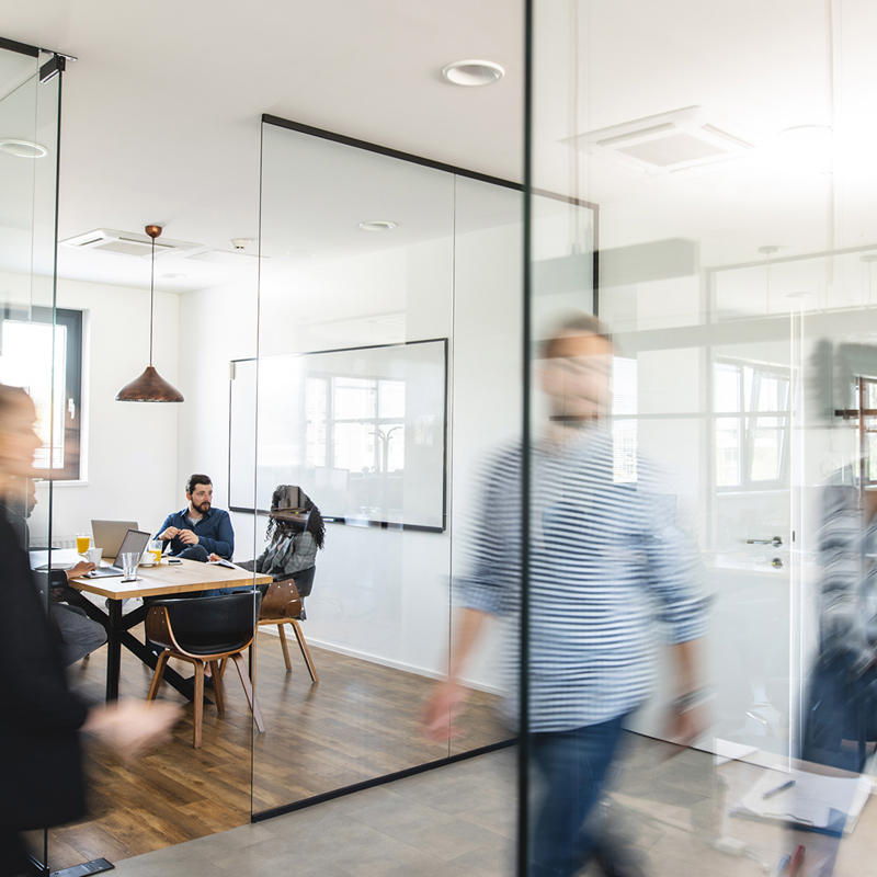 people walking in office
