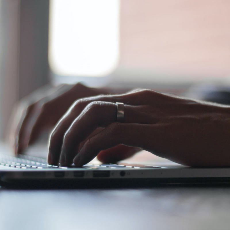 typing on laptop