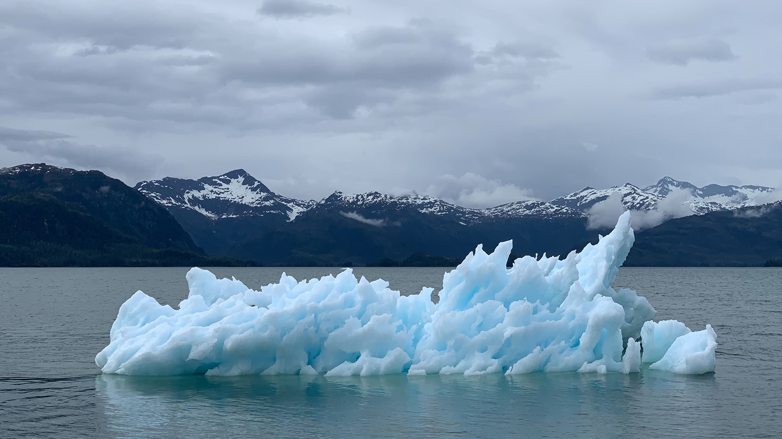 ice berg with mountain background 