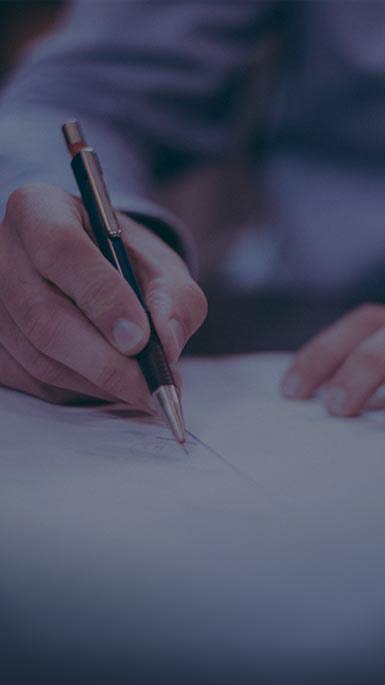 man completing paperwork
